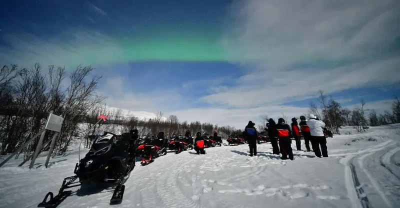 Abisko: Aurora Chasing with Snowmobiles — snowmobile tour in Kiruna